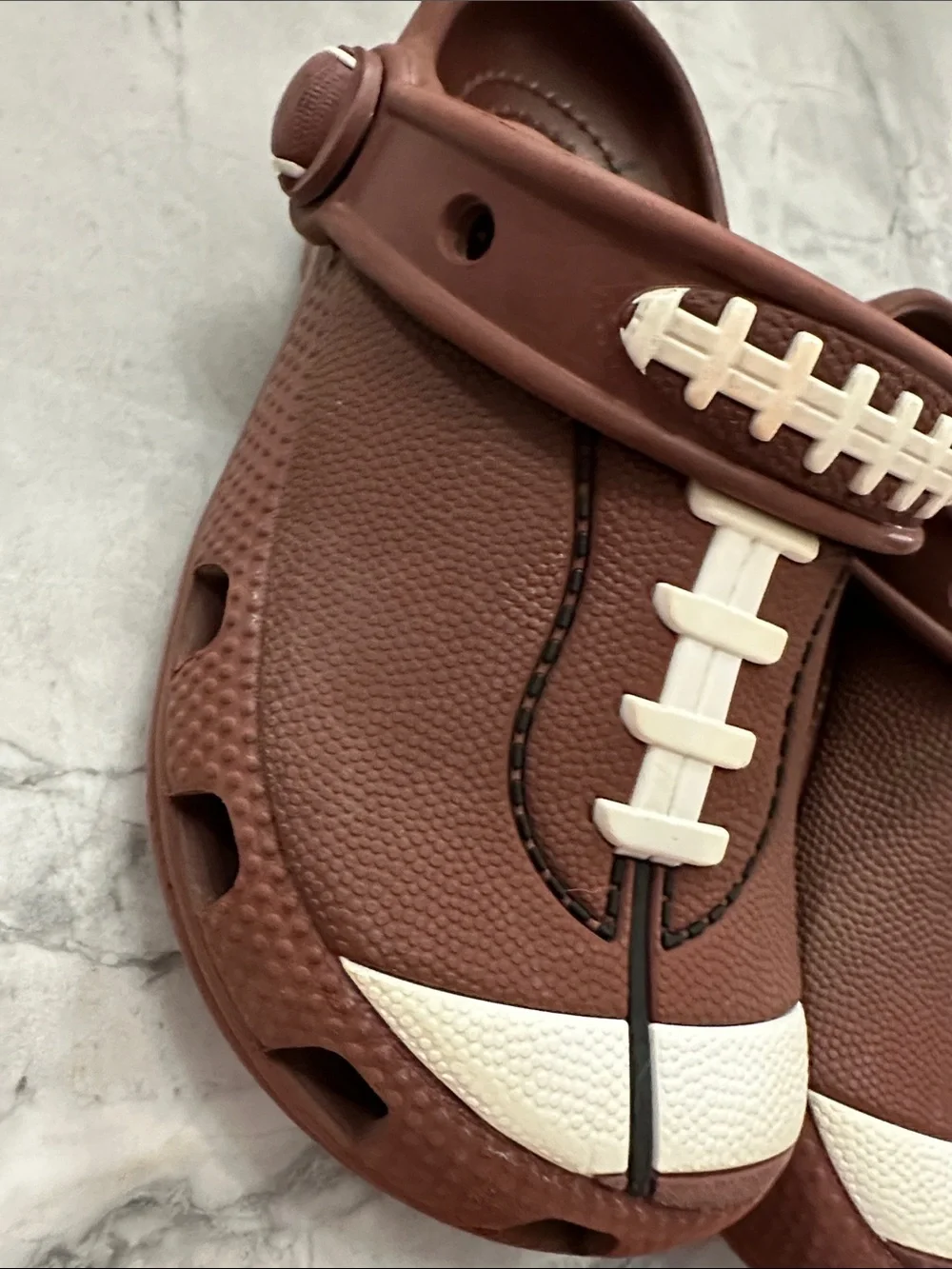 CROCS Kids Football Clog in Brown and White